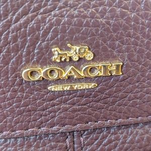Plum Coach purse